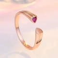 Macro detail of rose gold open ring featuring a vibrant pink heart-shaped crystal stone - Rose Gold (J298)