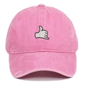 Detail of pink washed cotton baseball cap featuring white gesture embroidery on the front - Pink