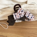 Detail of elegant brown tweed bow claw clip on wooden surface with pearls decoration - Tweed Bow Hair Claw (Coffee-White)