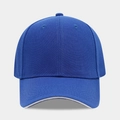 Detail of royal blue cotton baseball cap with ventilation eyelets and curved brim - Adjustable / Sapphire Blue