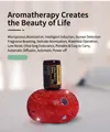 Macro view of smart red rhinestone diffuser with USB-C port and 15ml essential oil bottle - Luxury Rhinestone Studded - Red
