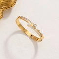 Fashionable golden stainless steel clover bracelet with sparkling zircon inlay details - Gold