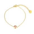 Minimalist 18K gold plated stainless steel bracelet with a round pink zircon on white background - Pink