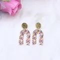 U-shaped acrylic earrings with multi-colored sequins and golden glitter stud finish - U Shape