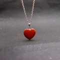 Elegant silver chain necklace featuring a red heart-shaped natural stone pendant - Heart Red Stone