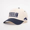 Close-up detail of YEEHAW embroidery and cowboy motif on a bicolor cotton baseball cap - One Size / Cream/Navy Blue
