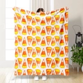 Morbida coperta di flanella con motivi a triangoli arancioni e gialli su base bianca - Stile Geometrico Triangolo Colore Caramella Bianco (71033-17)