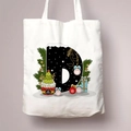 Christmas canvas tote bag featuring a festive letter D with holiday ornaments and trees - Letter D