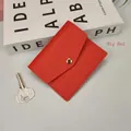 Slim bright red minimalist card holder with litchi texture and gold snap button - Red