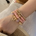 Bohemian multilayer beaded bracelet set with golden butterfly pendant for women - Pink