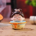 Cute sleeping Chinese doll tumbler figurine in a yellow bowl for desk decoration - Yellow Base Roly-poly (1213-9B)