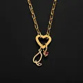 Gold stainless steel necklace with heart clasp and stethoscope charm with pink stone - Letter Q
