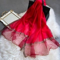 Red silk scarf with gold beads and lace trim displayed on a white fur rug background - 195CM / Red