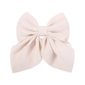 Close-up of floral jacquard texture and double-layered bow detail on beige hair clip - Beige