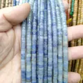 Macro shot of 3x6mm natural blue stone spacer beads for DIY jewelry making - Blue Aventurine