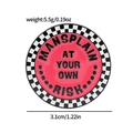 Pink enamel dagger pin with MANSPLAIN AT YOUR OWN RISK text and checkered border - Round Mansplain At Your Own Risk