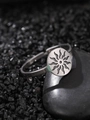 Detail of silver sun totem ring on black pebble with adjustable open band design - Sunflower Style (NR297)