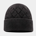 Close-up of winter knit beanie showing 3D diamond texture and ribbed cuff detail - Black
