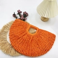 Handwoven vibrant orange half-moon straw tote bag with integrated circular handles - Orange