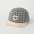 Close-up of checkered baby cap with cartoon bear patch and soft cotton texture - Toddler One Size / Cloth Label Bear Black