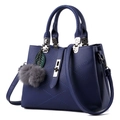 Bolso de mano azul oscuro en cuero granulado con costuras acolchadas y cierre giratorio - Azul oscuro