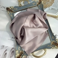 Detail view of the soft silk texture on a vintage gold frame and mirror tray - 15x150cm / Dusty Pink