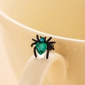 Spider stud earring featuring green heart crystal and blue round stone on ceramic - Single Piece / Green (Single Piece)