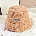 Winter brown teddy fleece bucket hat with Hai Talento woven label on plush background - One Size / Khaki