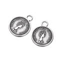 Detailed close-up of antique silver coin charms featuring Queen Elizabeth II portraits - Vintage Round Portrait 4 / Set of 4 / Antique Silver