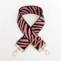 Detail of pink and black zebra pattern woven shoulder strap with gold swivel hooks - Deep Pink Zebra Print / Gold Buckle