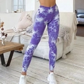 High-waisted seamless yoga leggings featuring a purple tie-dye pattern and peach lift design - Lilac Stone