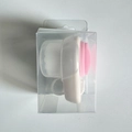 Dual-sided silicone facial brush with pink bristles in a clear packaging box - White - With Lid + Box