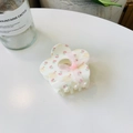 Detail of floral claw clip with white base, pink roses, duck pattern and ribbon bow - Acrylic / Pink Ribbon Floral Flower