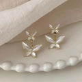 Elegant gold butterfly earrings with white enamel finish and shimmering pearlescent detail - Gold Butterfly (1#)