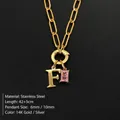 14K gold plated stainless steel initial F necklace with a pink gemstone pendant - Letter F
