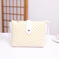 Petit sac seau blanc à motifs circulaires jaunes avec rabat magnétique et bandoulière - Blanc