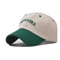 Detail of embroidered NEBRASKA letters on a contrast beige and green baseball cap - Adjustable / Green Patchwork