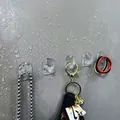 Waterproof adhesive wall hook showing heavy load capacity with keys in wet bathroom - Mini Small Hook
