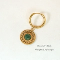 Macro detail of Bohemian gold hoop earrings with green stone and size dimensions - Hollow African Jade