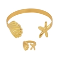 Golden ocean theme jewelry set featuring starfish and seashell open bangle and ring - Gold Bracelet and Ring Set