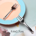 Macro view of miniature alloy forks for dollhouse DIY, measuring 0.6x2.7cm each - Small Fork