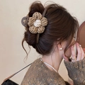 Knitted flower hair claw clip in beige and brown displayed on model back view - 1pc Set Plush Flower