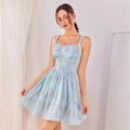 Detail of light blue floral print dress featuring sweet heart neckline and thin straps - XS / Light Blue Floral