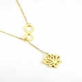 Golden infinity and lotus pendant necklace in stainless steel on a white background - Infinity and Lotus