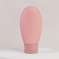 Tubo de viaje de silicona rosa para loción con acabado mate y tapa abatible - 60ml / Rosa