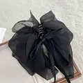 Elegante pinza per capelli in chiffon nero con doppio fiocco su vassoio decorativo - Nero