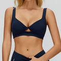Dunkelblauer Yoga-BH mit Twist-Knoten-Front und modischem Hohlraum-Design am Rücken - S / Abgrundblau