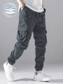 Vista dettagliata dei pantaloni cargo grigio antracite leggeri con tasche e cerniere - S / grigio scuro