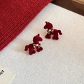 Macro shot of red flocked pony earrings with golden bow and pearl detail for women - Red Flocked Pony Bow Stud Earrings (33# Silver Earring Post - Red)