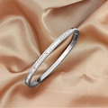 Bracciale in acciaio al titanio argento lucido con zirconi su raso champagne - Color Acciaio